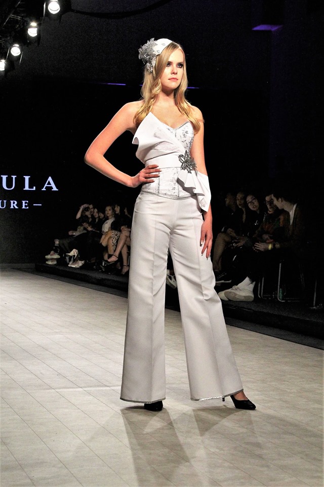 Gundula Couture design of a corset, wide well pants, and a waist application - Picture is of Vancouver Fashion Week Runway 2020 Photographed by Mac C Yeah